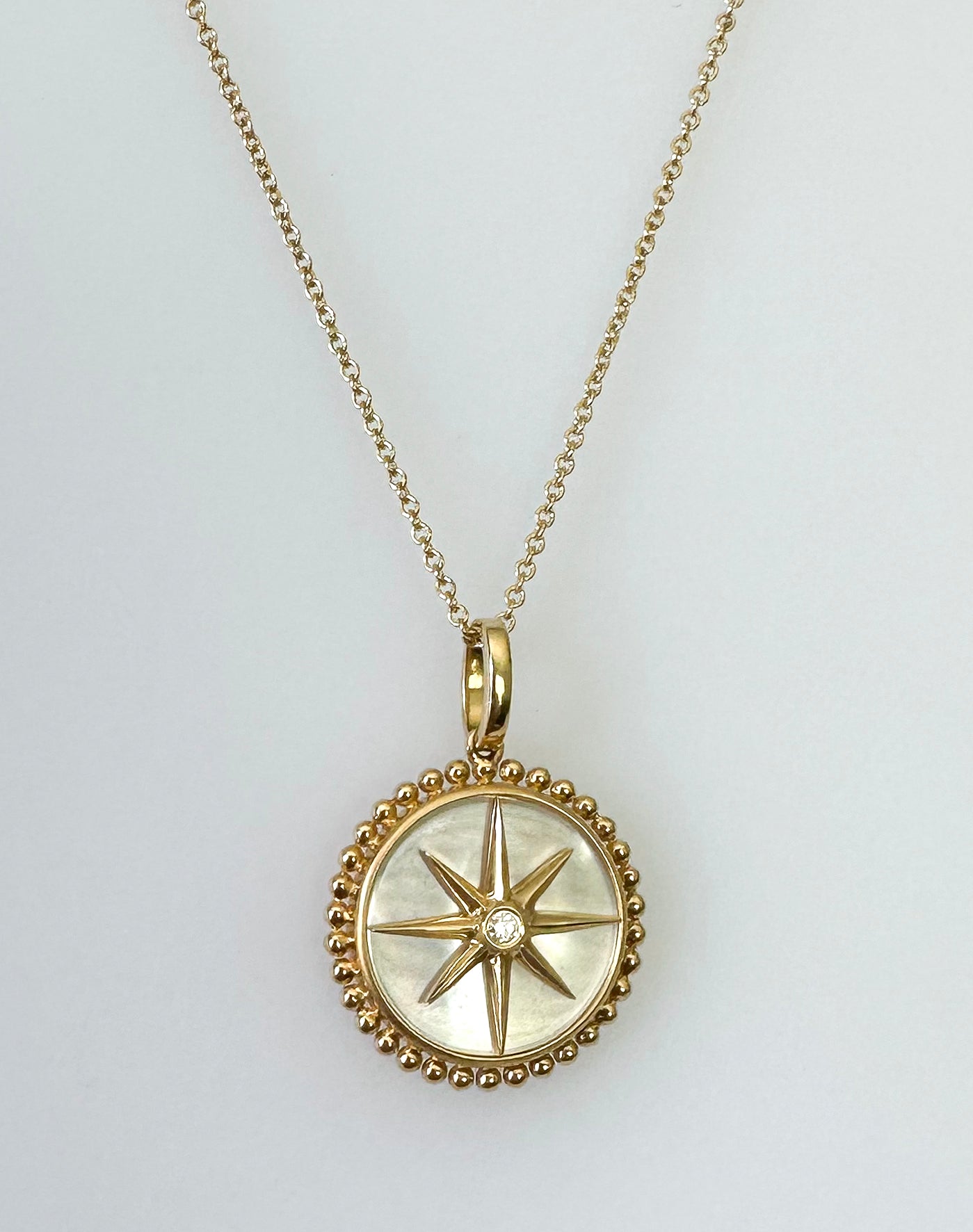 18K Yellow Gold Mother of Pearl Starburst Necklace