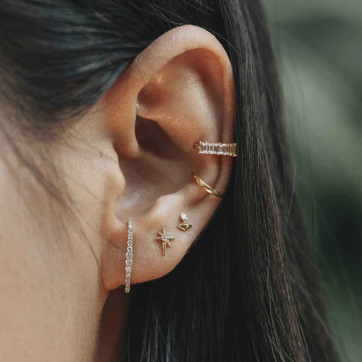 STAR | 14K Yellow Gold Single Diamond Starburst Piercing Earring Front