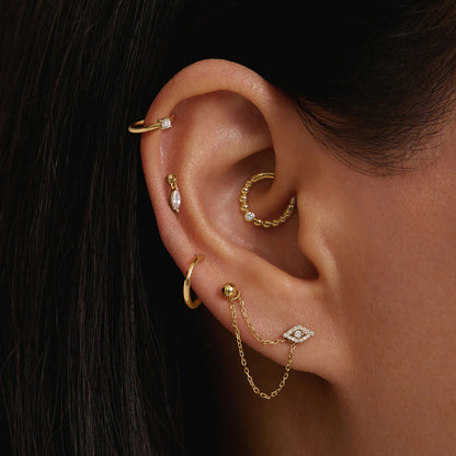 SKYLAR | 14K Yellow Gold Diamond Evil Eye Piercing Earring Front